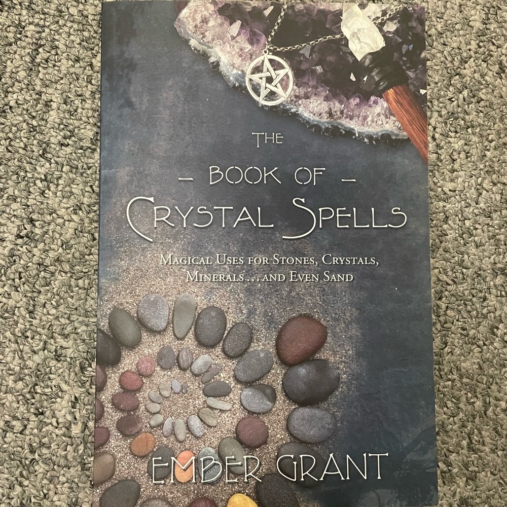 Hardly used crystal spell book. Easy and magickal read!